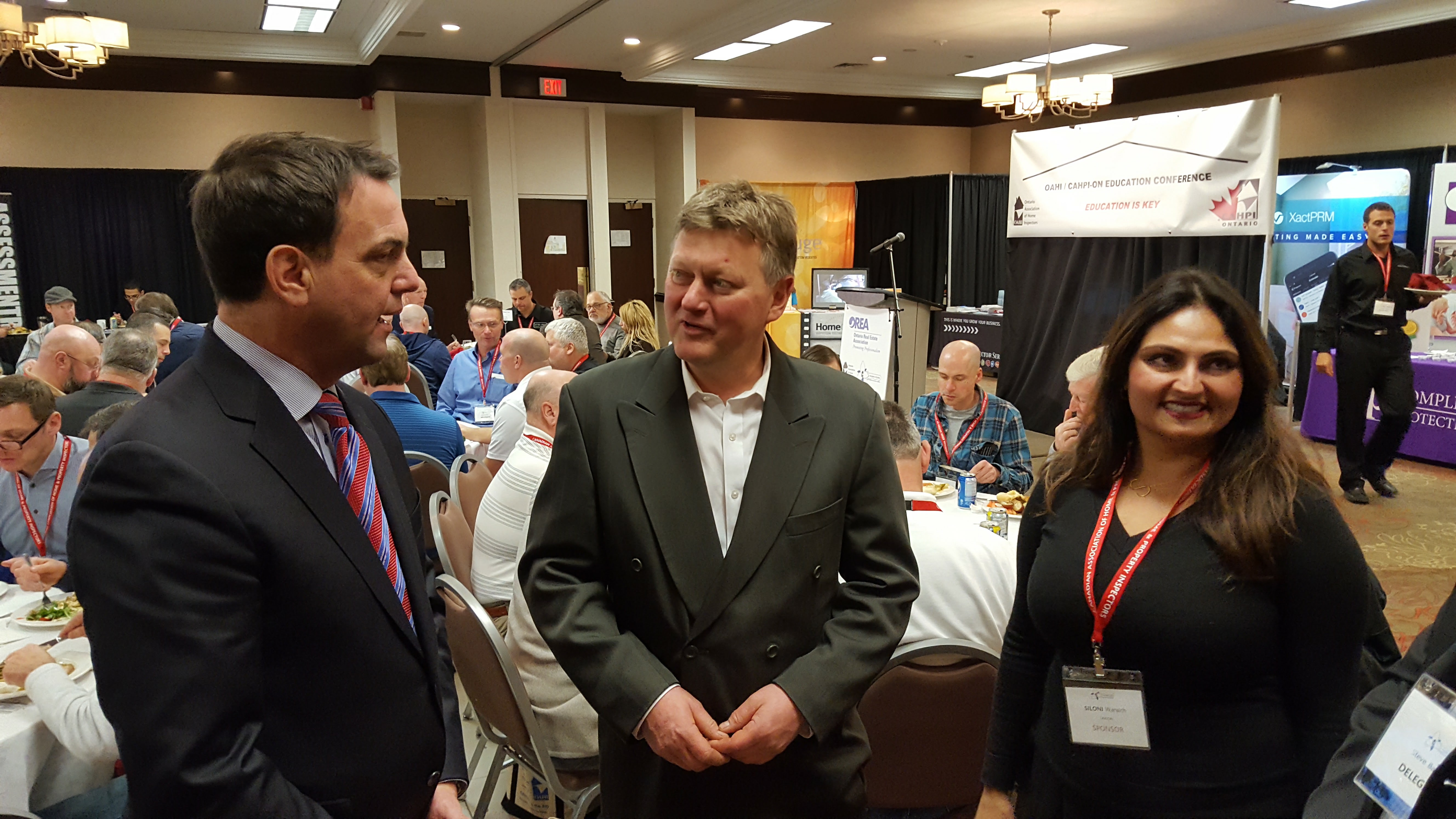 OREA's Tim Hudak with OAHI's Murray Parish and Siloni Waraich of Tarion